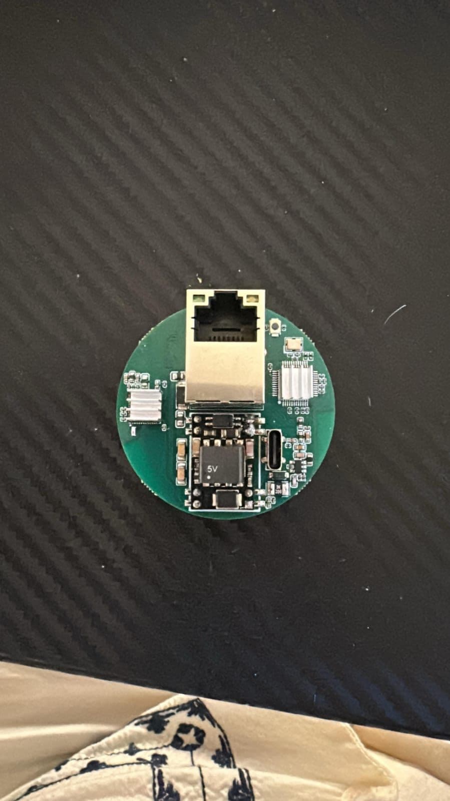 Angled view of the assembled gateway board and its through-hole and surface-mount components